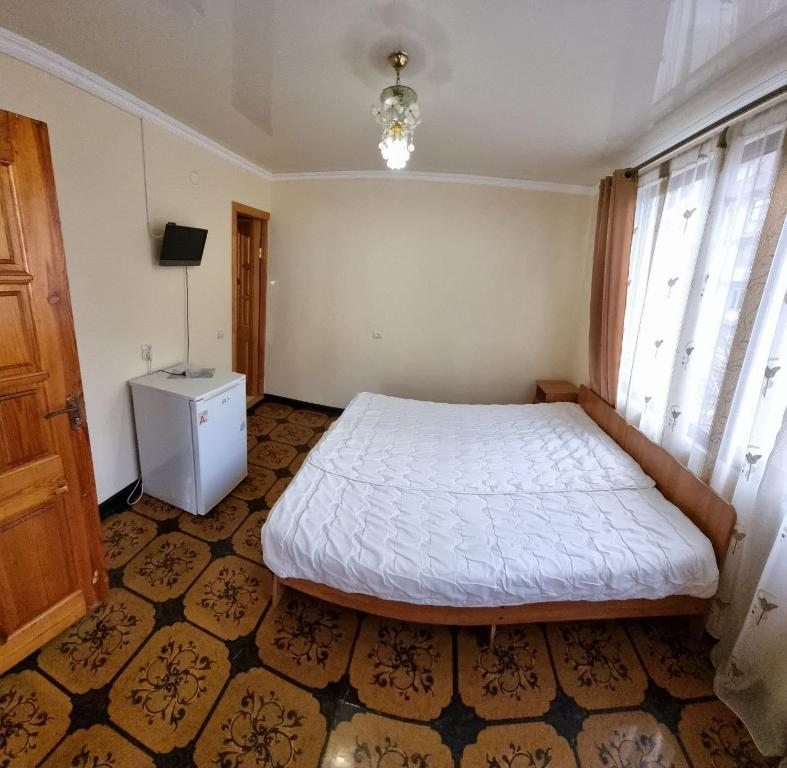 Двухместный (Бюджетный двухместный номер с 1 кроватью или 2 отдельными кроватями) гостевого дома Гостевой дом на Турбазе на ул. Акиртава, Сухум