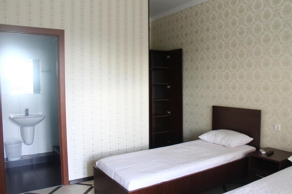 Двухместный (Бюджетный двухместный номер с 1 кроватью или 2 отдельными кроватями) гостевого дома Гостевой дом Черное море, Алахадзы
