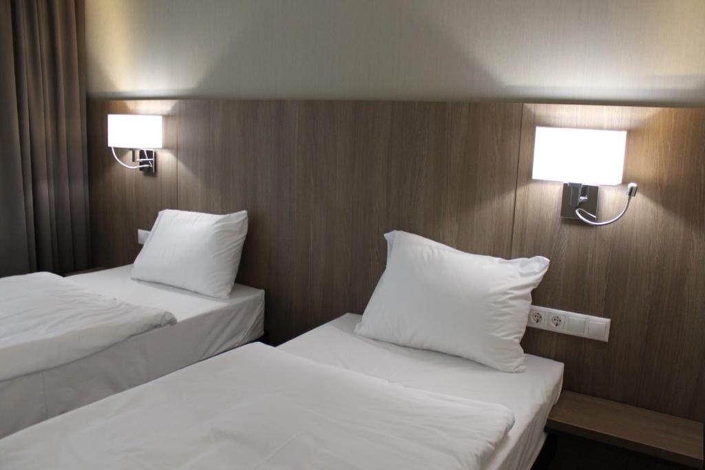 Двухместный (Двухместный номер с 2 отдельными кроватями) отеля Фанагория Отель Порт Запад, Тамань