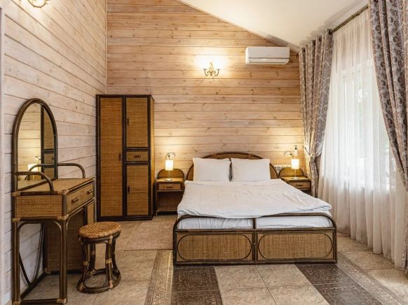 Фотография номера гостиницы Поляна Сказок