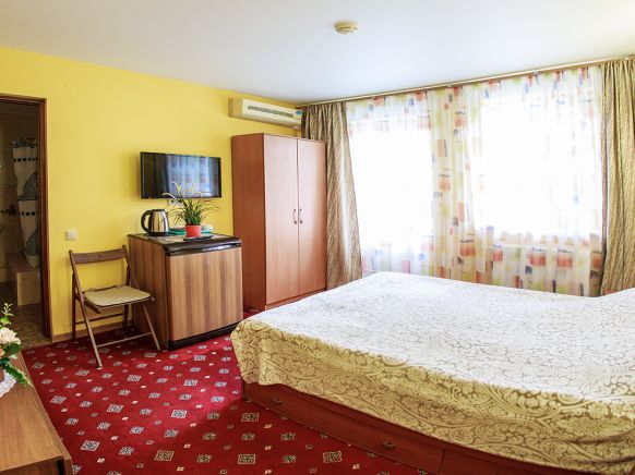 Фотография номера мини отеля Изумрудный