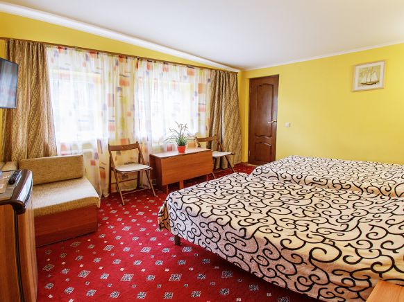 Фотография номера мини отеля Изумрудный