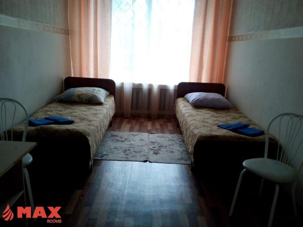 Номер (Односпальная кровать в общем номере) гостиницы MAXROOMS Здвинск Сибирия