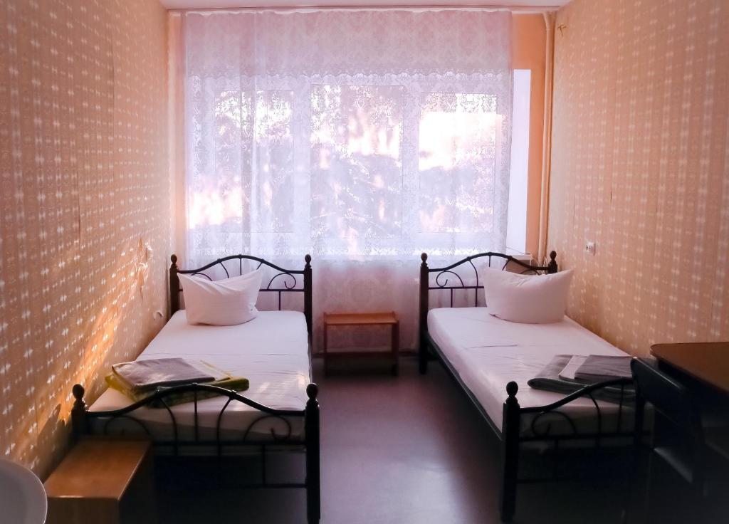 Двухместный (Бюджетный двухместный номер с 2 отдельными кроватями) отеля База Биатлон, Екатеринбург