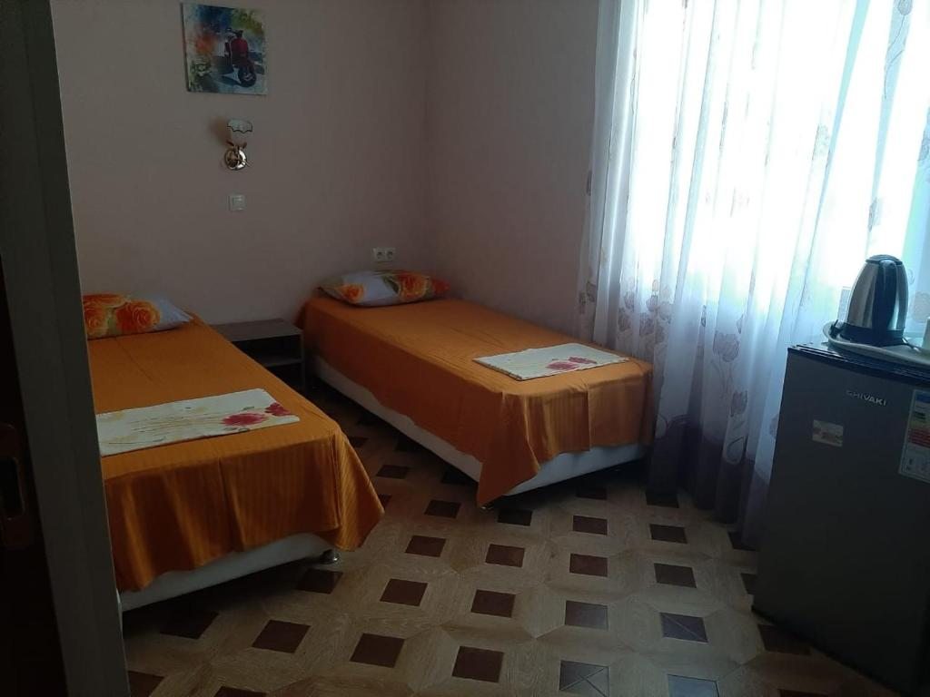 Двухместный (Двухместный номер Делюкс с 2 отдельными кроватями) гостевого дома Сан-Тропе, Сочи