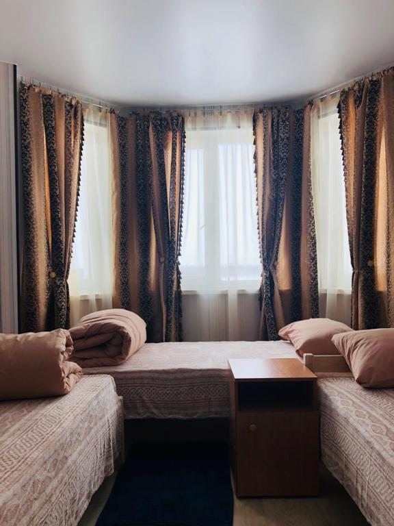 Номер (Односпальная кровать в общем номере для мужчин и женщин) хостела SleepRoom, Новый Уренгой