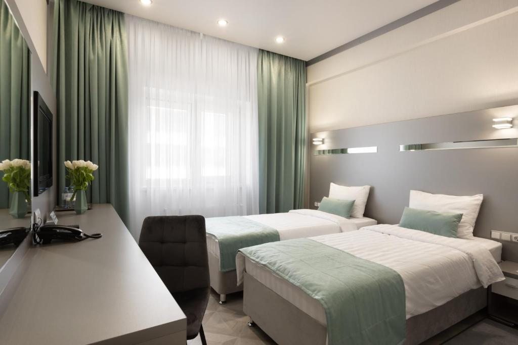 Двухместный (Стандартный двухместный номер с 1 кроватью или 2 отдельными кроватями) отеля Parallel Congress by Stellar Hotels, Краснодар