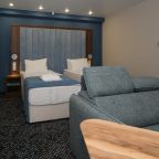 Просторный однокомнатный номер с двумя раздельными кроватями