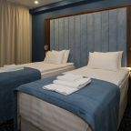 Просторный однокомнатный номер с двумя раздельными кроватями