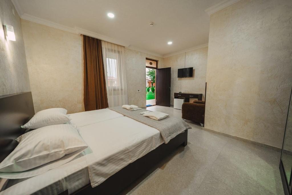 Двухместный (Стандартный двухместный номер с 2 отдельными кроватями) отеля Kobes Marani, Телави