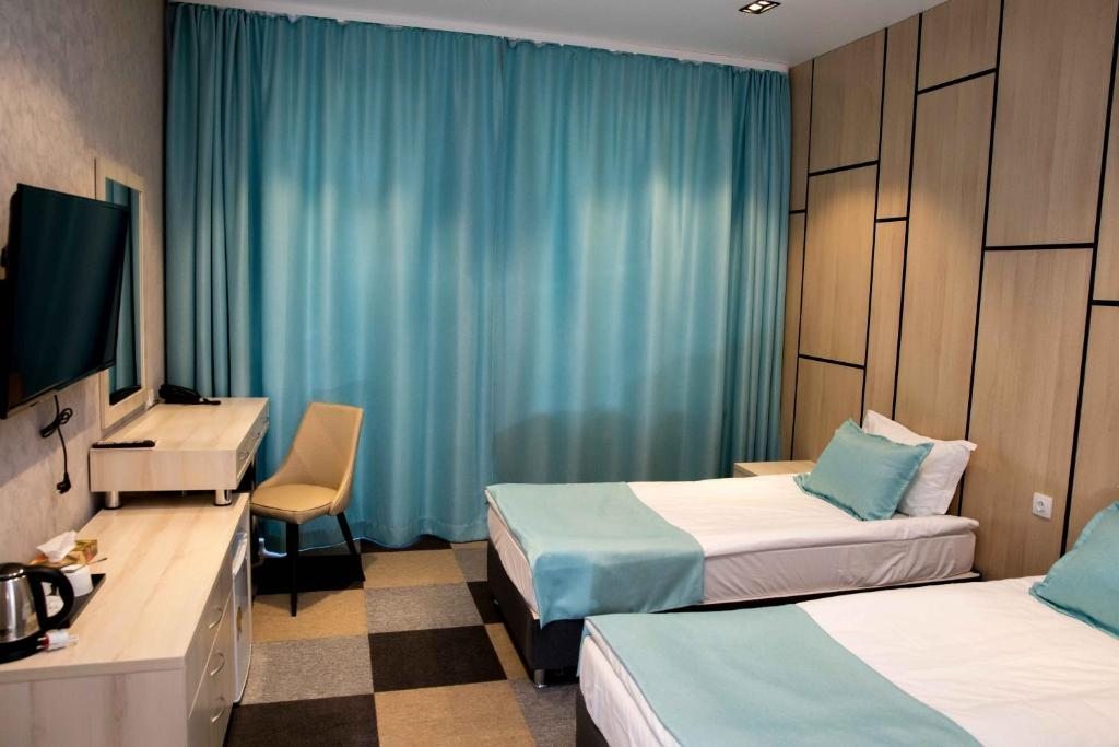 Двухместный (Двухместный номер с 2 отдельными кроватями) отеля Гостиничный комплекс Be Fine, Бескайнар