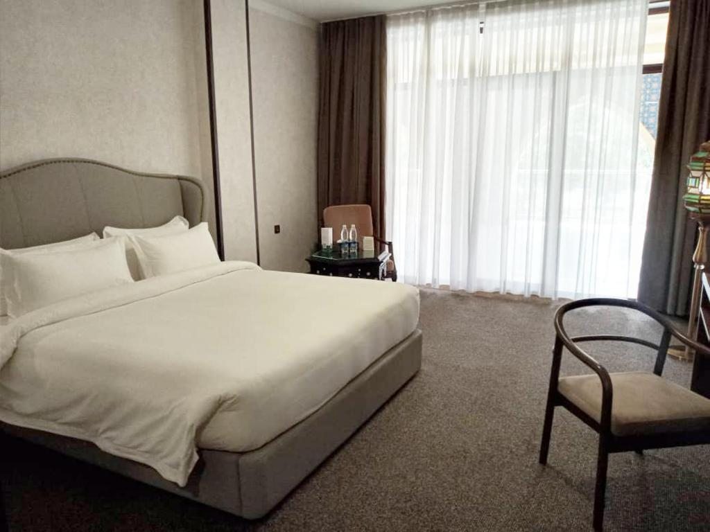 Двухместный (Двухместный номер Делюкс с 1 кроватью или 2 отдельными кроватями) отеля Жаннат Резорт Ош