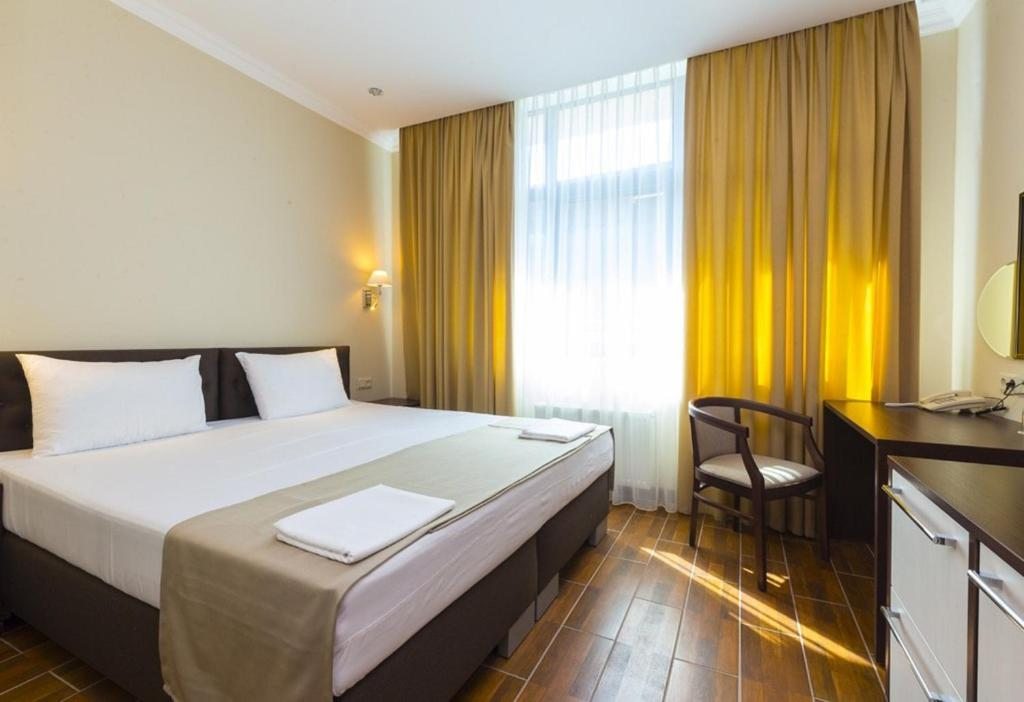 Двухместный (Двухместный номер с 1 кроватью или 2 отдельными кроватями) отеля Mini Korpus on Demerjipa, Гагра