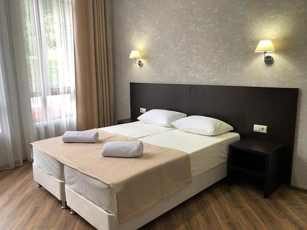 Двухместный (Двухместный номер с 1 кроватью или 2 отдельными кроватями) отеля Мини-отель 