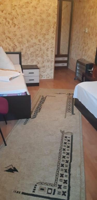 Двухместный (Двухместный номер с 2 отдельными кроватями) гостевого дома Гостевой дом Анастасия, Сухум