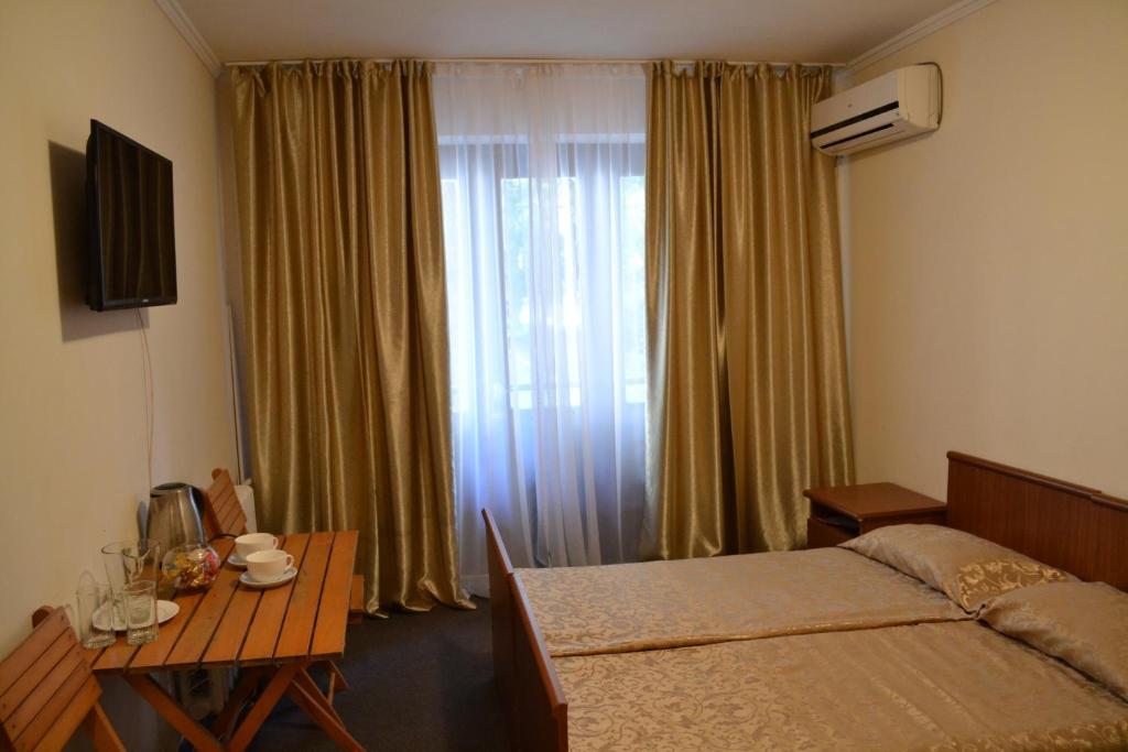 Двухместный (Двухместный номер с 1 кроватью или 2 отдельными кроватями) отеля Пансионат Айтар, Сухум