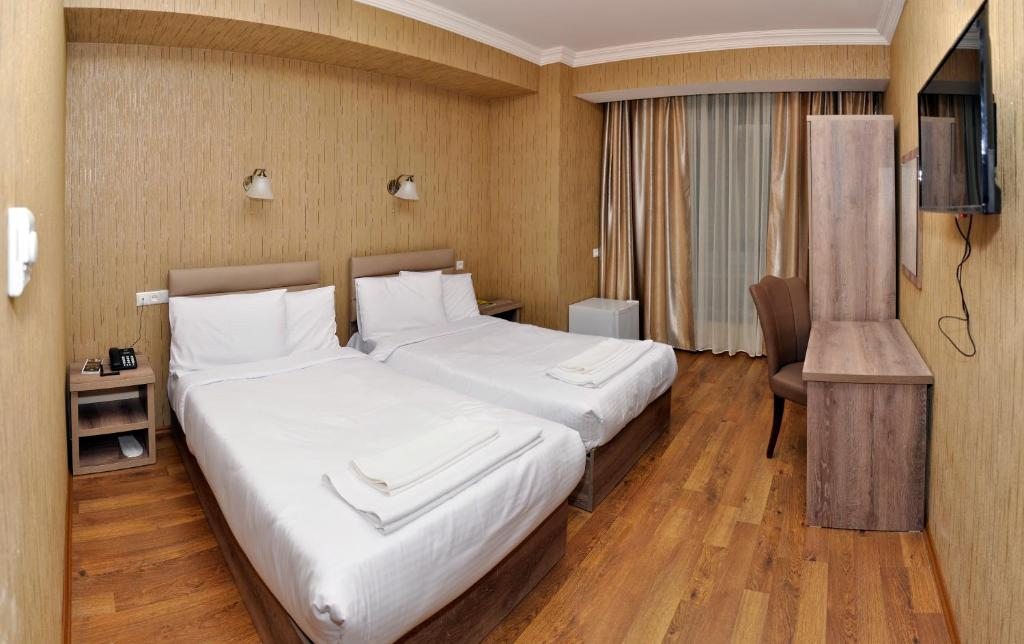 Двухместный (Стандартный двухместный номер с 2 отдельными кроватями) отеля L Plaza Hotel, Тбилиси