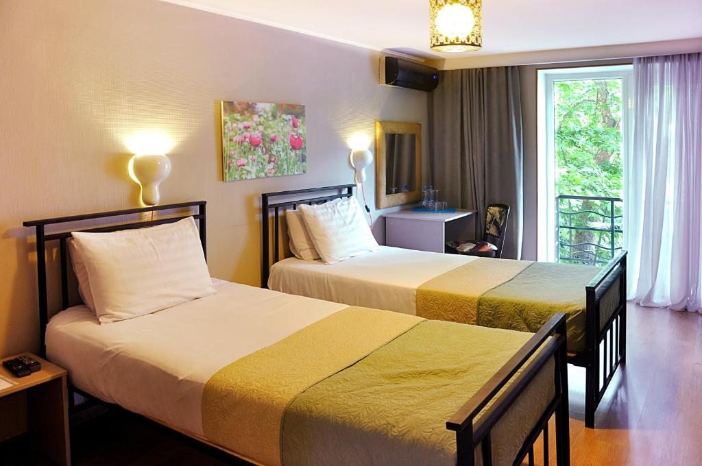 Двухместный (Стандартный двухместный номер с 2 отдельными кроватями) отеля Art Hotel Claude Monet, Тбилиси