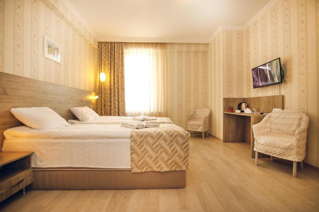 Двухместный (Просторный двухместный номер с 2 отдельными кроватями) отеля Hotel Kenari, Тбилиси