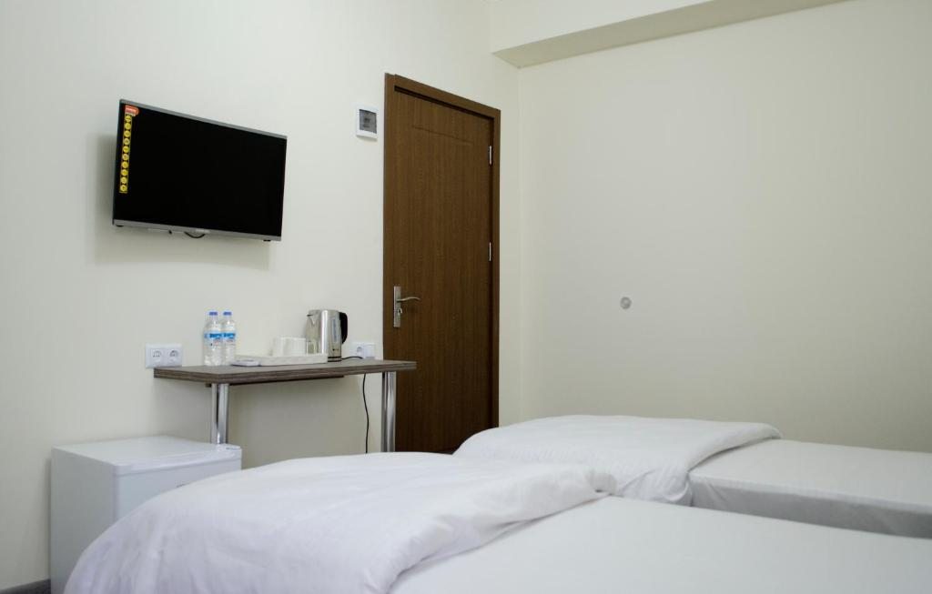 Двухместный (Двухместный номер с 1 кроватью или 2 отдельными кроватями) отеля Hotel M9, Тбилиси