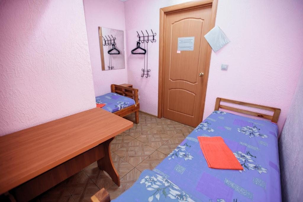 Номер (Односпальная кровать в общем номере) хостела Агат, Омск