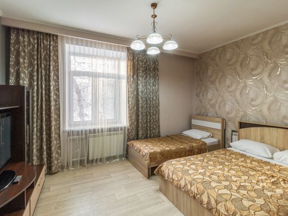 Фотография номера гостиницы На Октябрьской