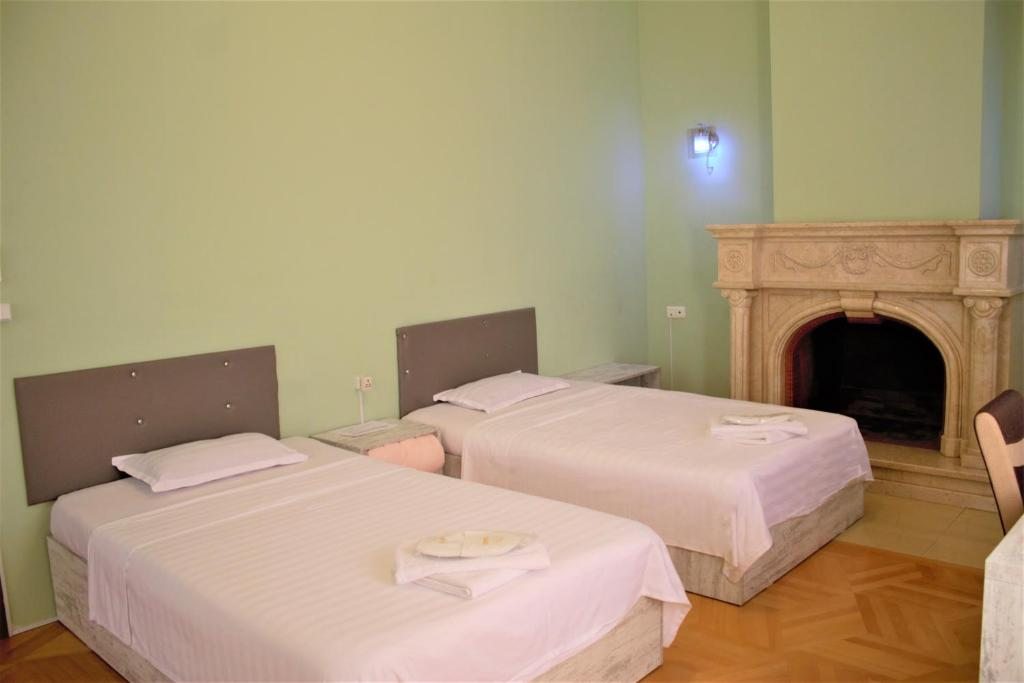 Двухместный (Стандартный двухместный номер с 2 отдельными кроватями) отеля FangXin Hotel, Тбилиси