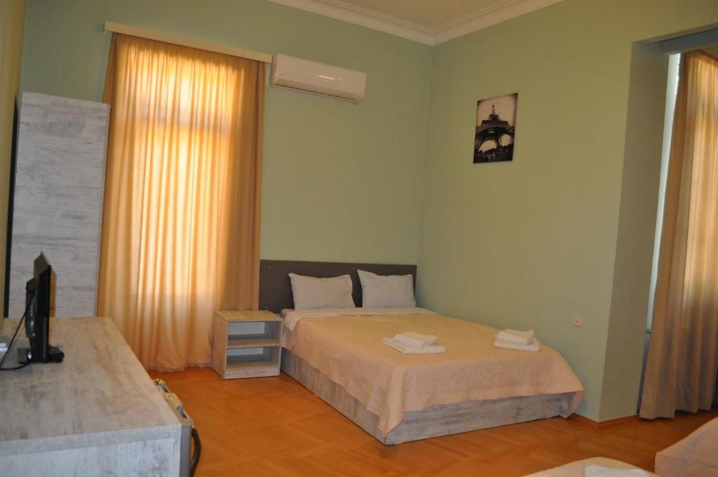 Двухместный (Двухместный номер с 2 отдельными кроватями и ванной) отеля FangXin Hotel, Тбилиси