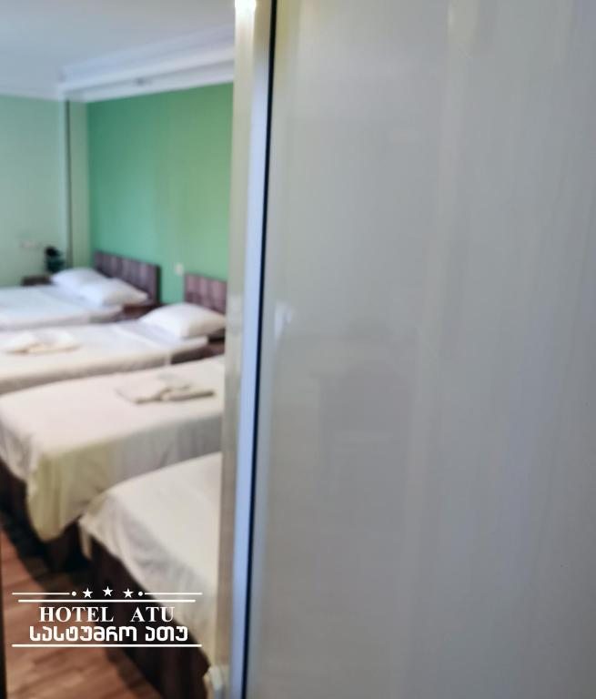 Семейный (Cемейный номер с собственной ванной комнатой) отеля Hotel Atu, Тбилиси