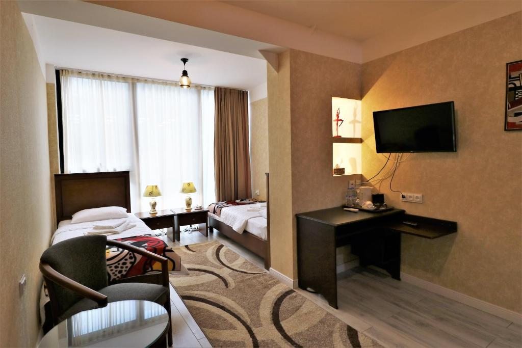Двухместный (Стандартный двухместный номер с 2 отдельными кроватями) отеля Hotel Liberty Theatre, Тбилиси