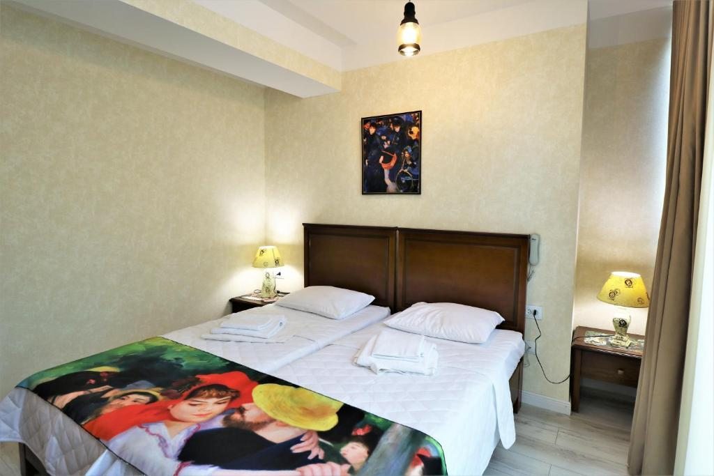 Двухместный (Небольшой двухместный номер с 2 отдельными кроватями) отеля Hotel Liberty Theatre, Тбилиси
