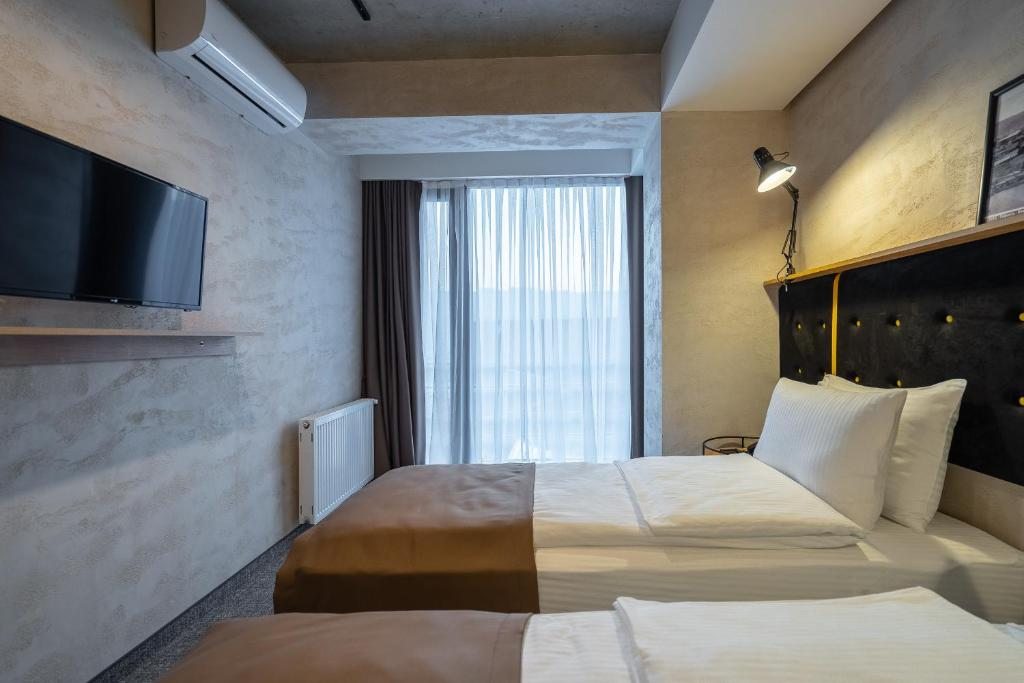 Двухместный (Двухместный номер с 1 кроватью или 2 отдельными кроватями) отеля Tbilisi Story Hotel, Тбилиси