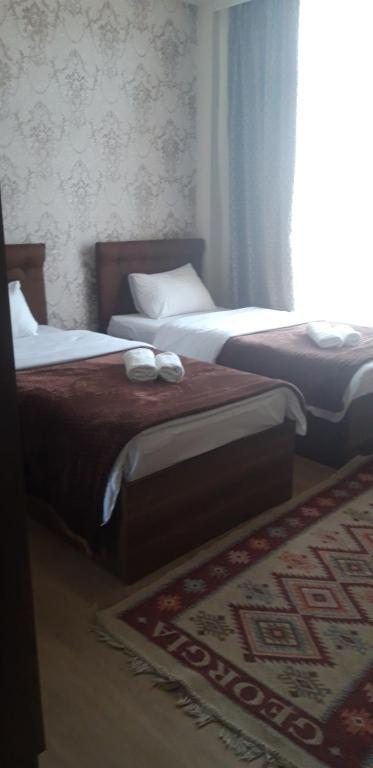 Двухместный (Двухместный номер с 2 отдельными кроватями) гостевого дома Hotel IVERIA, Степанцминда