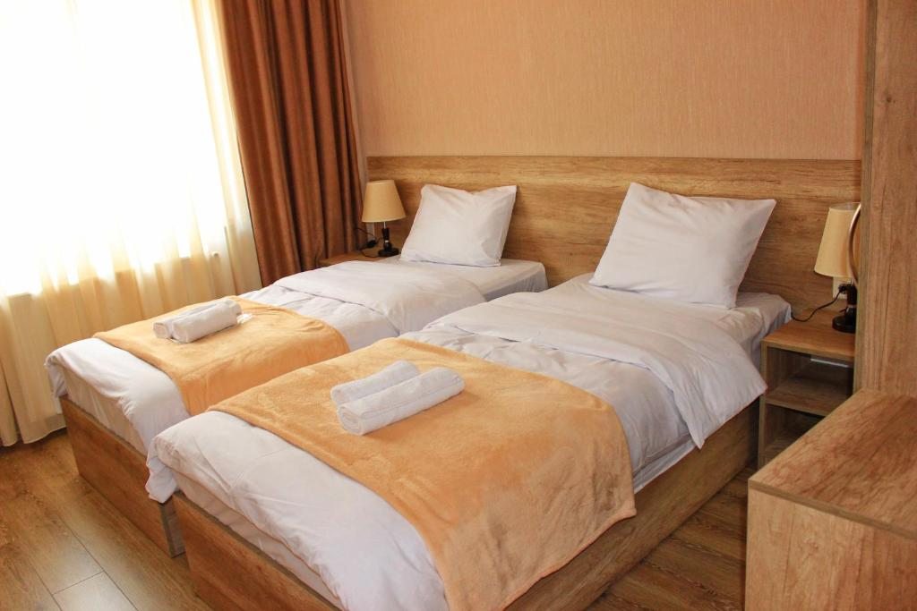 Двухместный (Двухместный номер с 2 отдельными кроватями) отеля Sunshine Kazbegi, Степанцминда