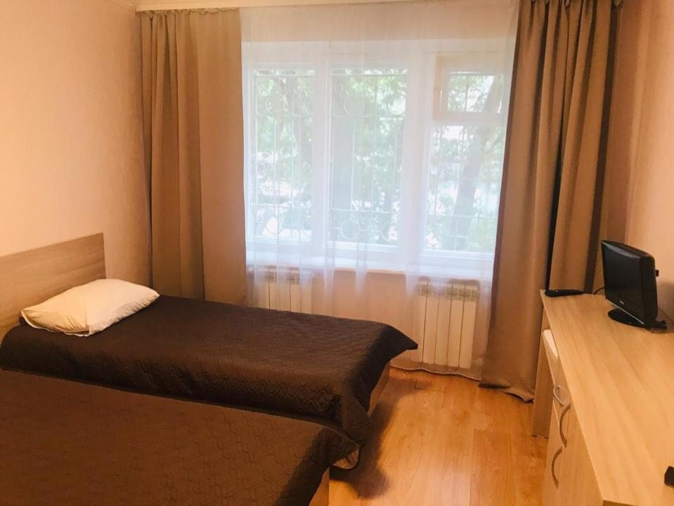 Двухместный (Бюджетный двухместный номер с 2 отдельными кроватями) отеля Славянка-Копейск