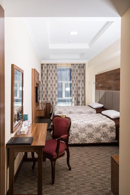 Двухместный (Улучшенный двухместный номер с 1 кроватью или 2 отдельными кроватями) отеля Гранд отель Евразия, Алматы