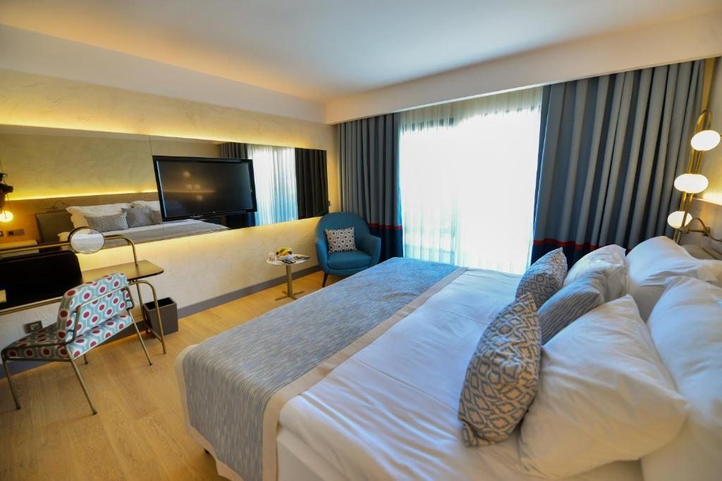 Двухместный (Двухместный номер с 1 кроватью) отеля The Residence at TUI SENSATORI Resort Barut Fethiye - Ultra All Inclusive - Adults Only, Фетхие