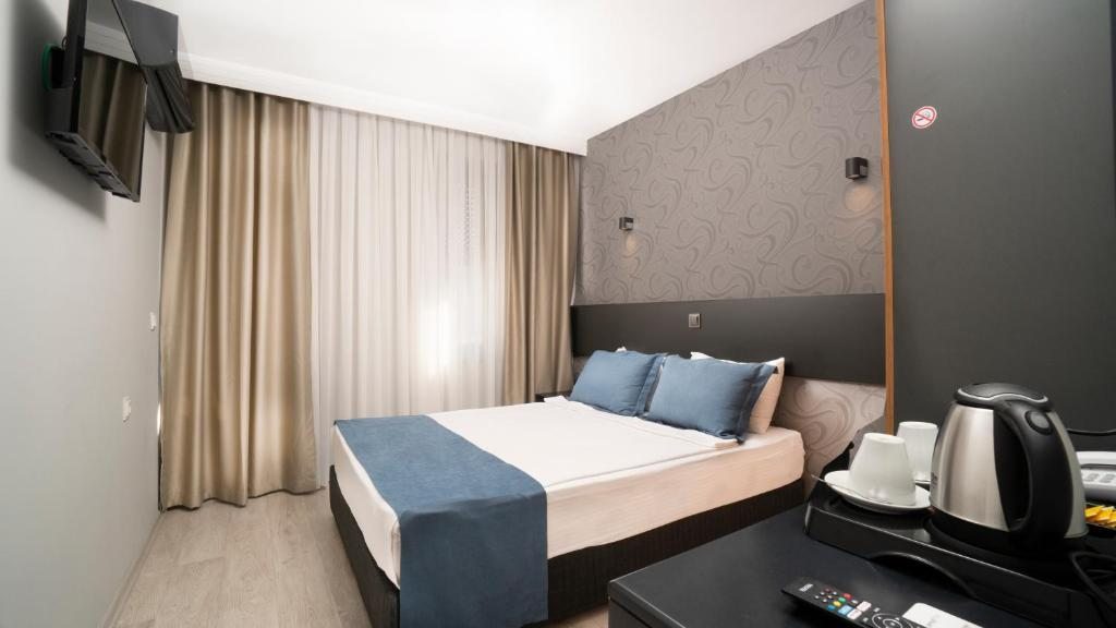 Двухместный (Улучшенный двухместный номер с 1 кроватью) отеля Mahper Hotel, Анталия