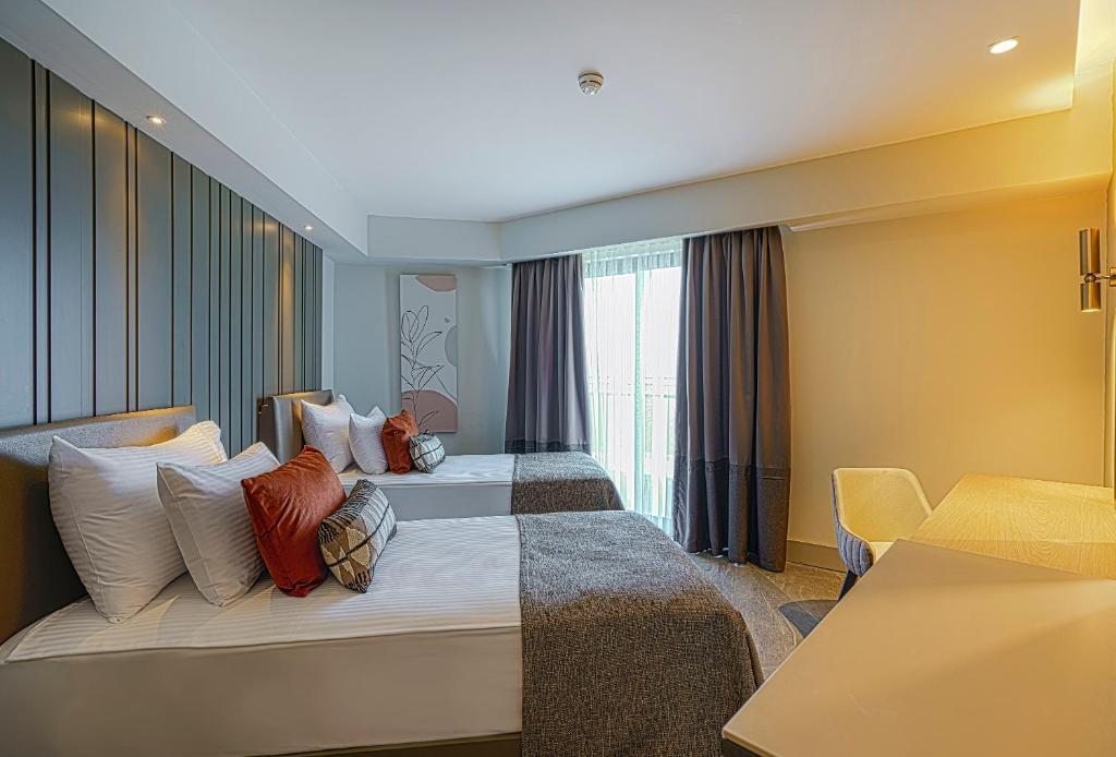 Двухместный (Стандартный двухместный номер с 2 отдельными кроватями) отеля Kirman Calyptus Resort & SPA, Сиде