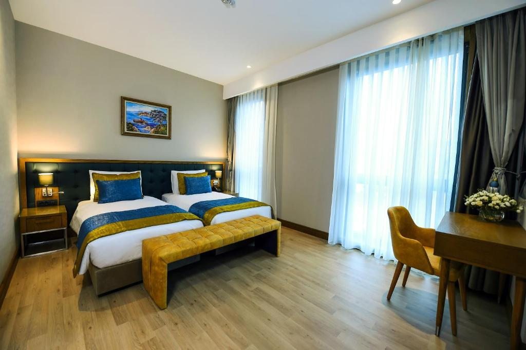 Двухместный (Двухместный номер Делюкс с 1 кроватью или 2 отдельными кроватями) отеля CHER HOTEL İstanbul Beyoğlu, Стамбул