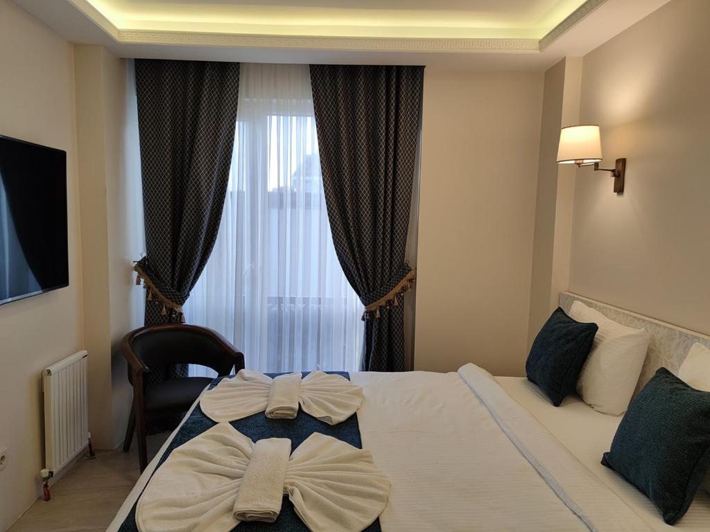 Двухместный (Небольшой двухместный номер с 1 кроватью) отеля Galata Hotel & Suites, Стамбул