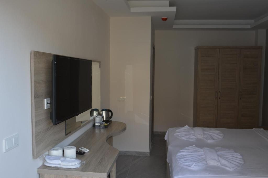 Двухместный (Двухместный номер эконом-класса с 1 кроватью или 2 отдельными кроватями) отеля Seyir Village Hotel, Олюдениз