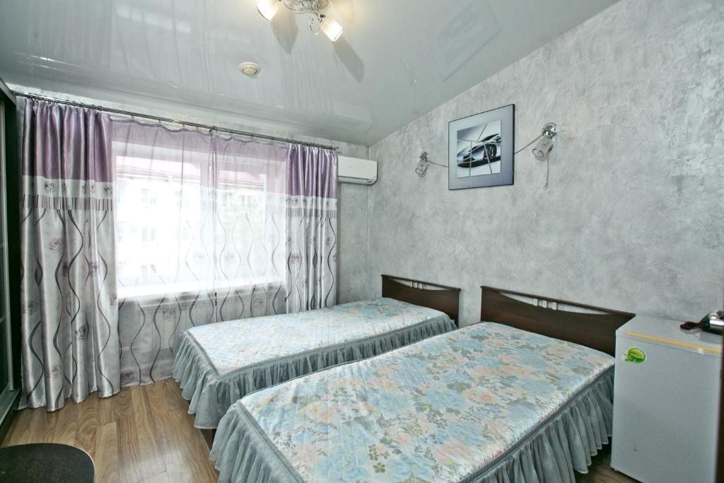 Двухместный (Бюджетный двухместный номер с 2 отдельными кроватями) гостиницы Форсаж, Уссурийск