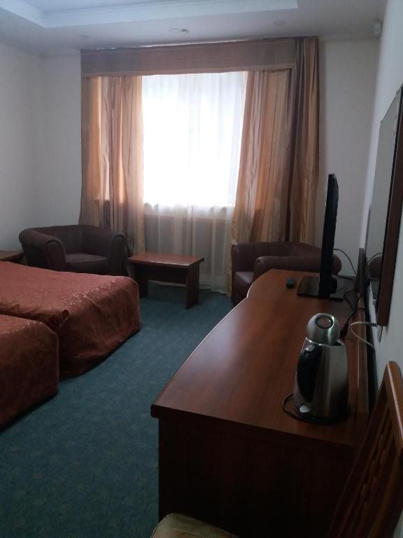 Двухместный (Улучшенный двухместный номер с 2 отдельными кроватями) отеля Дубрава, Соликамск