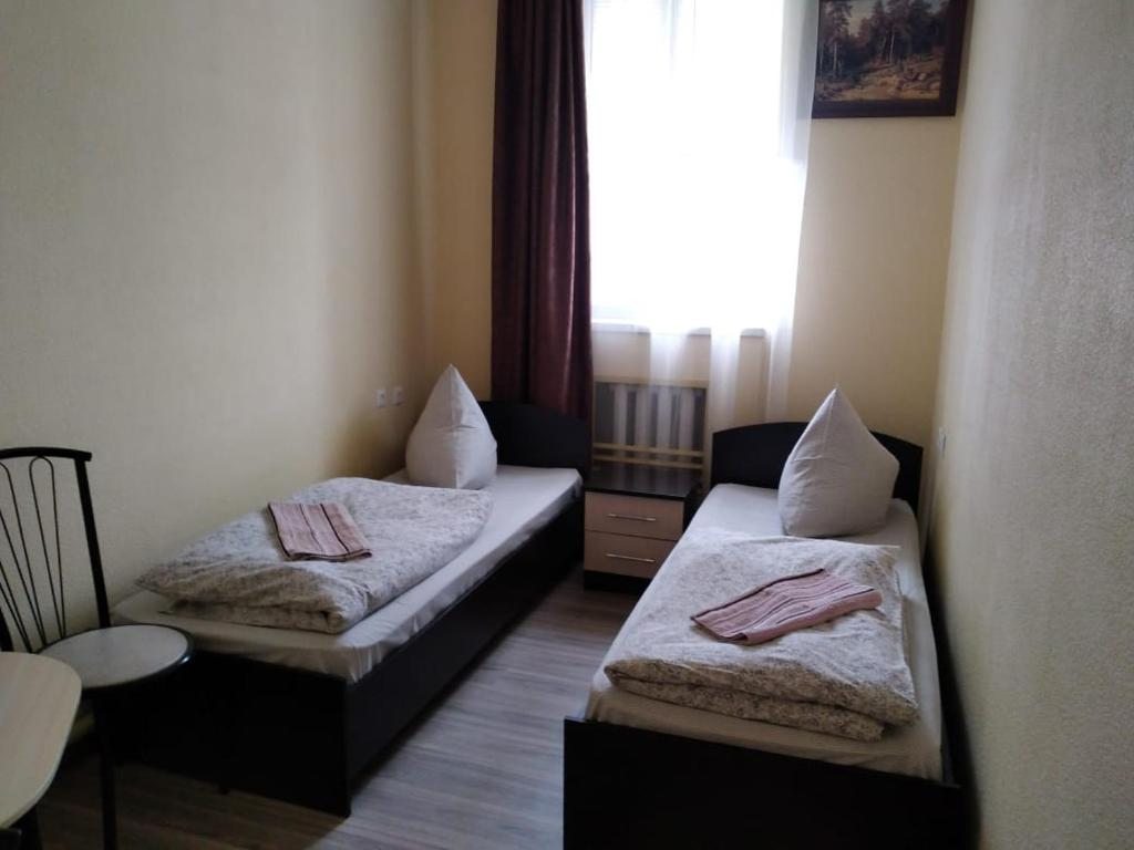 Двухместный (Двухместный номер с 2 отдельными кроватями и душем) отеля Отель, Батайск