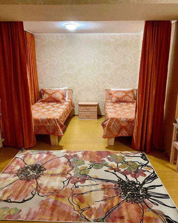 Двухместный (Улучшенный двухместный номер с 2 отдельными кроватями) отеля Гостинично-Банный комплекс Альянс, Новокузнецк