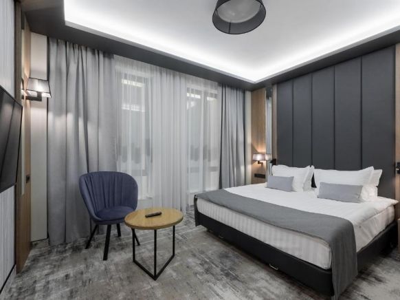 Фотография номера гостиницы Мегаполис Отель Набережная