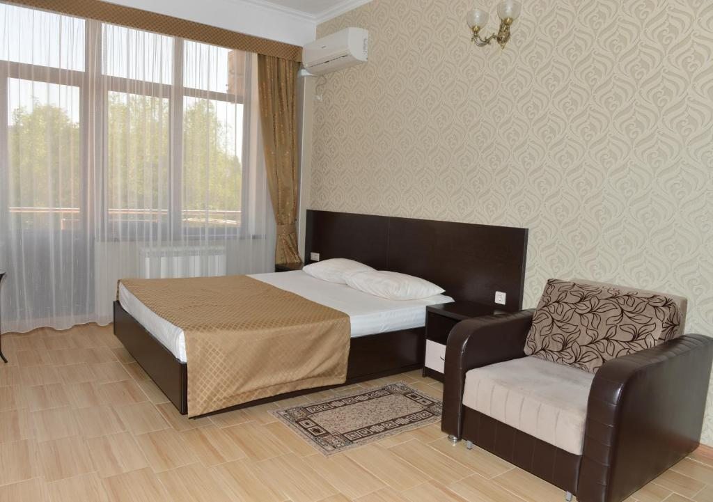 Двухместный (Двухместный номер «Комфорт» с 1 кроватью или 2 отдельными кроватями) отеля Олимпия Лазаревское