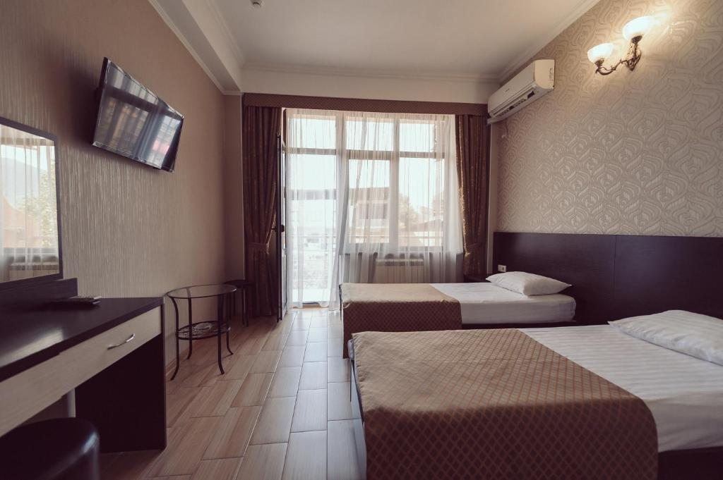 Двухместный (Стандартный двухместный номер с 2 отдельными кроватями) отеля Олимпия Лазаревское