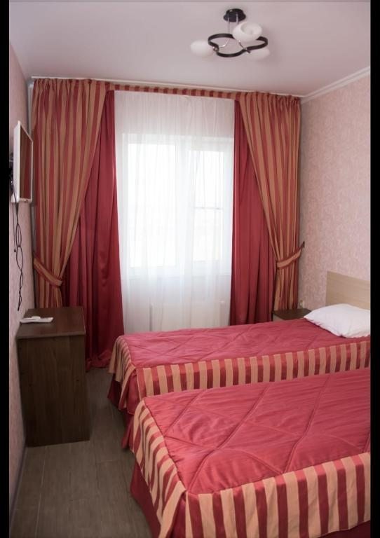 Двухместный (Двухместный номер Делюкс с 2 двуспальными кроватями) отеля Motel 149 km, Ильич